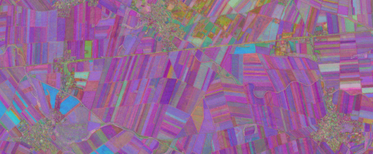 Austria's small agricultural fields rendered in false colour by TESSERA's embeddings
